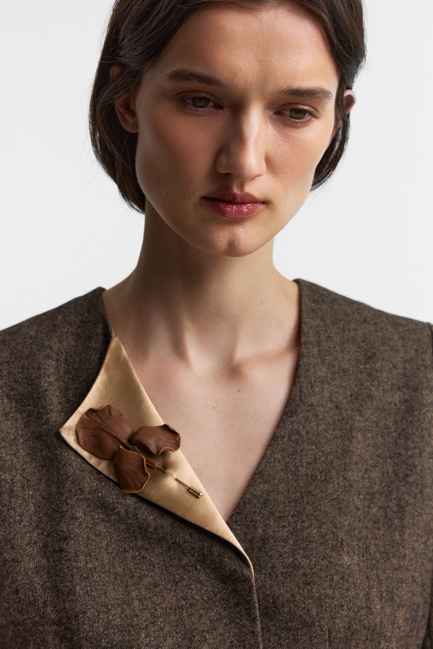 Iris brooch in burned umber