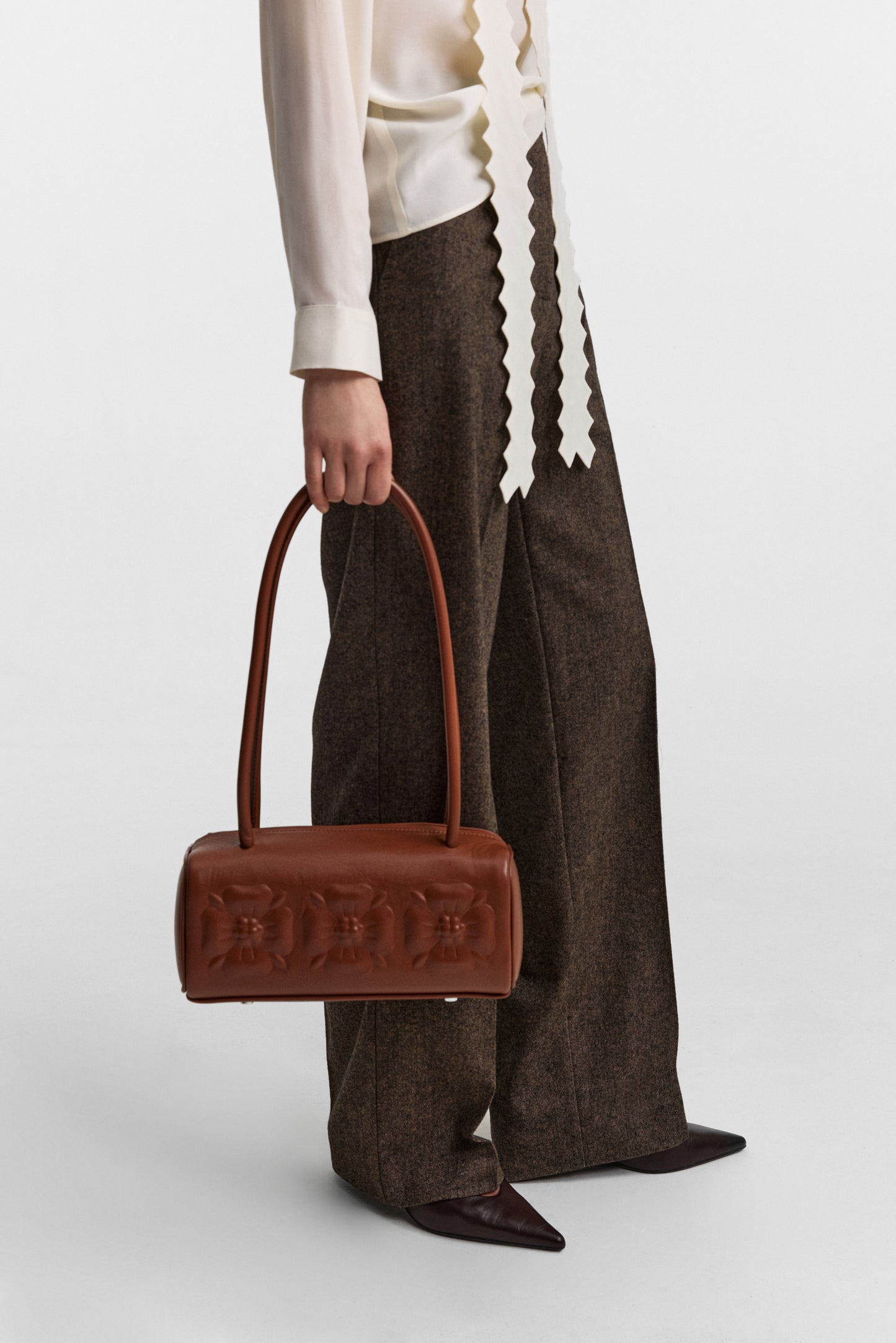 Bas-relief bag in burned umber