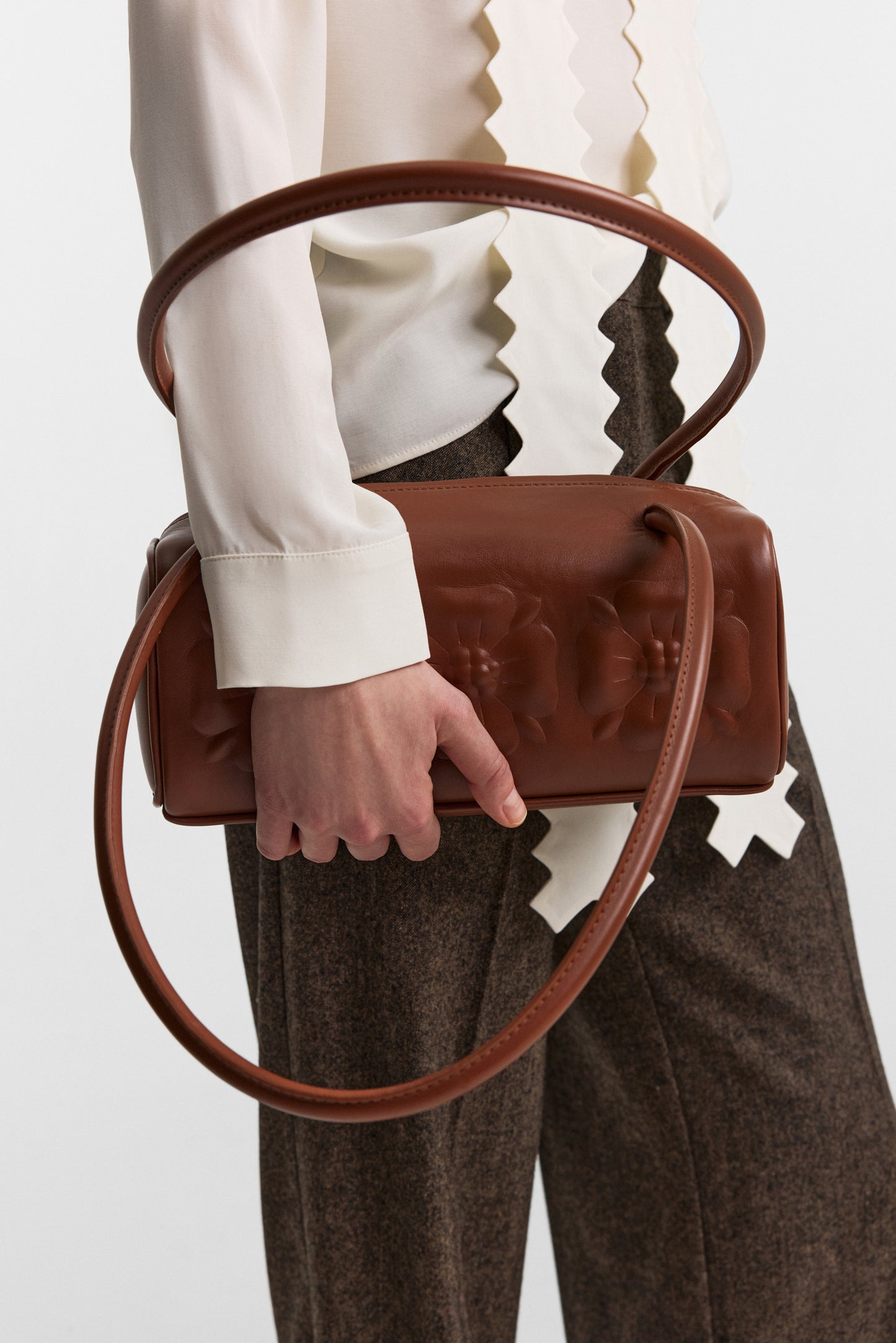 Bas-relief bag in burned umber